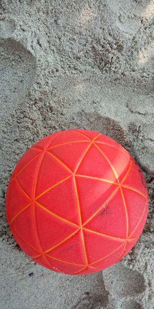 istock Beach handball ball on a sandy beach with a copy space 1501082532