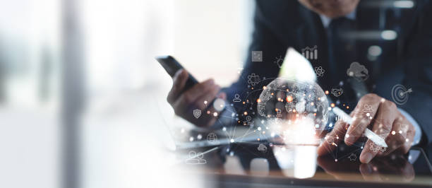 istock Digital marketing, Business Strategy, E-commerce. Businessman using tablet analysis economy finance and market data with interface icons, Banking, Finance, global network connection technology 1501091041