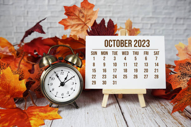 istock October 2023 monthly calendar maple leaf decoration on wooden background 1501095408