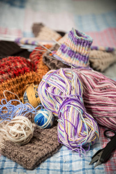 istock Colored threads, knitting needles and other items for hand knitting 1501096051
