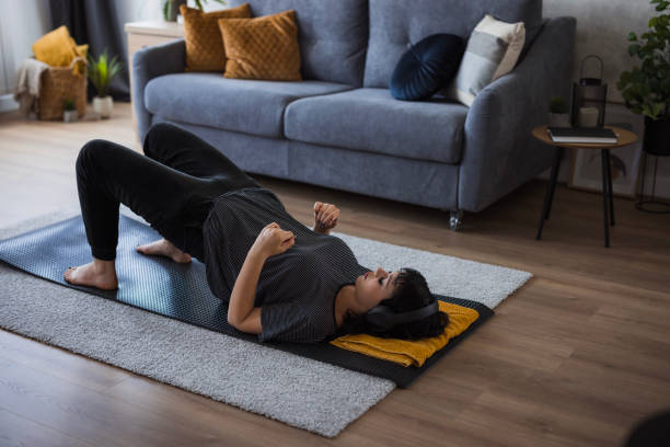 istock Girl working out at home 1501096569