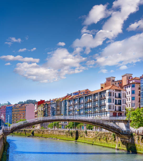 Bilbao Puente de la Ribera bridge over Nervion river and facades in Biscay Basque Country of Spain