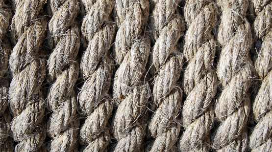 Close up image of twisted natural fiber rope or hemp rope texture.