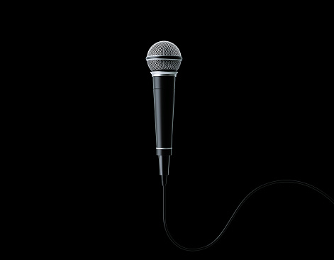 Microphone on black background. Horizontal composition with copy space.