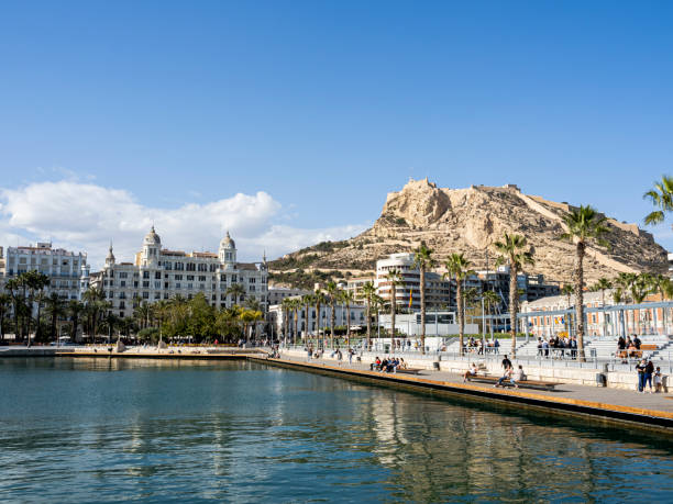 View of port of Alicante with Santa Bárbara castle at background, Valencian Community, Spain. 04/01/2023.