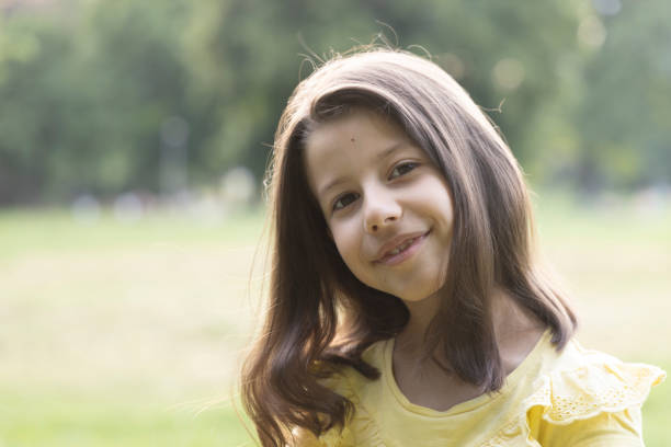 Portrait of a girl outdoors stock photo