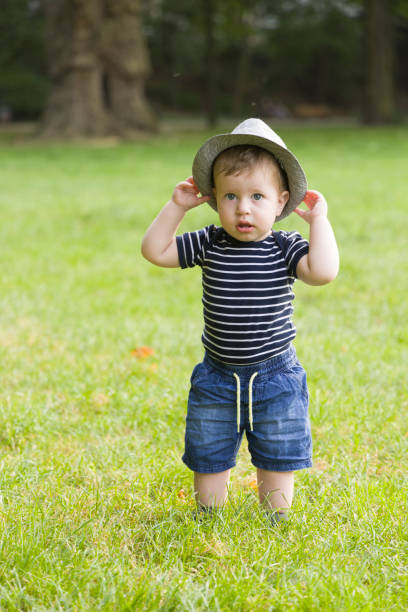 Baby boy outdoors stock photo