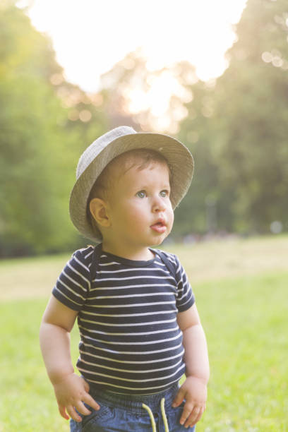 Baby boy outdoors stock photo