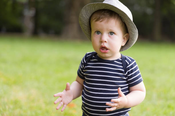 Baby boy outdoors stock photo
