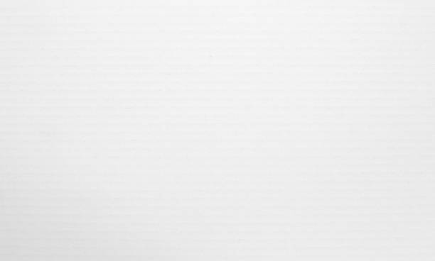 istock White cardboard sheet texture background, detail of recycle paper box pattern. 1501121091