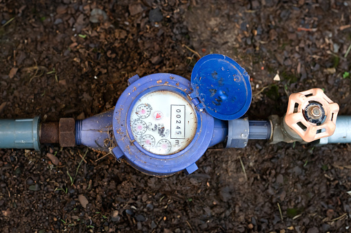Water meter to regulate the amount of household water usage