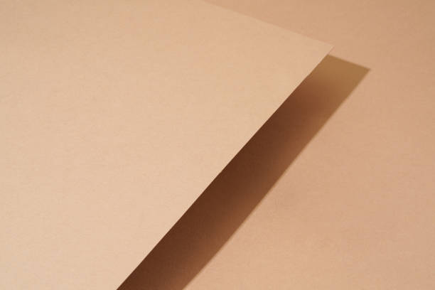 istock The colorful background from brown paper with shadow. Abstract geometric 1501129352