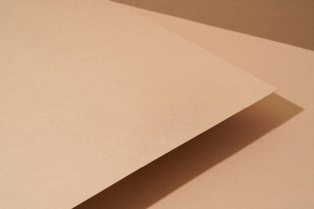 istock The colorful background from brown paper with shadow. Abstract geometric 1501129360