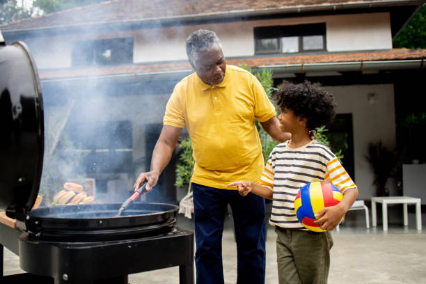 Family is preparing a barbecue outside