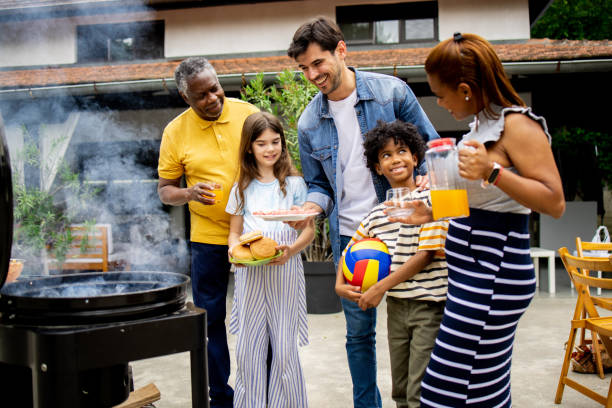 istock Family is preparing a barbecue outside 1501137922