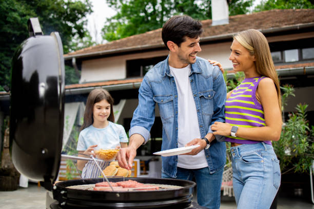 istock Family is preparing a barbecue outside 1501137935