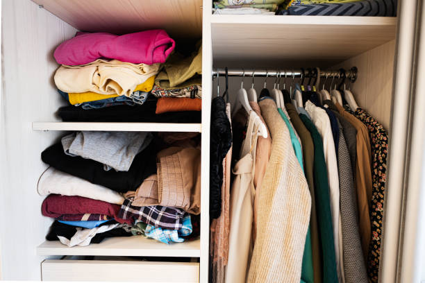 istock Closet with different clothes in wardrobe 1501140092