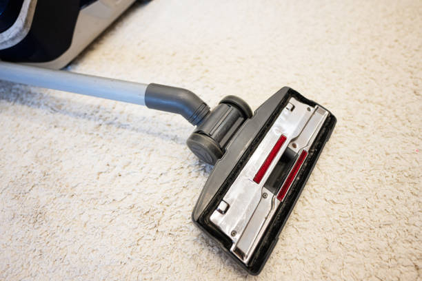 istock Vacuum cleaner cleaning carpet with a cordless vacuum cleaner. 1501140108