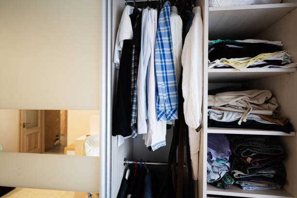 istock Closet with clothes and accessories inside the room. 1501140197