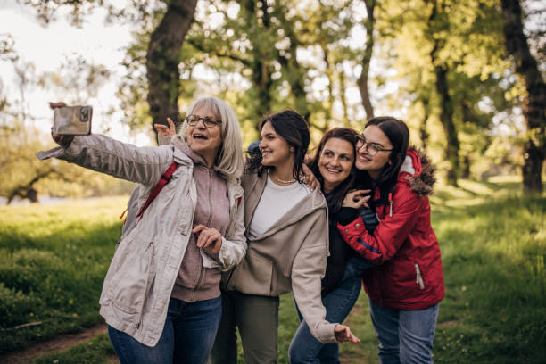 istock Happy family taking a selfie in nature 1501141982