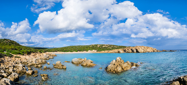 Granite rocks, Mediterranean scrub and golden sand at the charming Cala Cipolla along the Chia coast (8 shots stitched)
