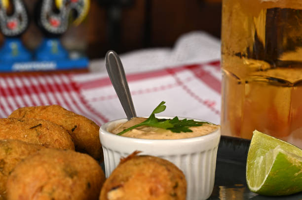 istock Fried codfish fritter typical Portuguese and Brazilian cuisine fish with herbs. 1501149443