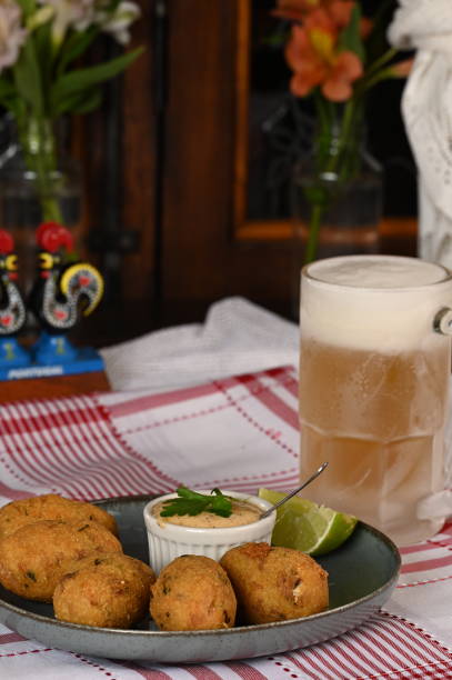 istock Fried codfish fritter typical Portuguese and Brazilian cuisine fish with herbs. 1501149495