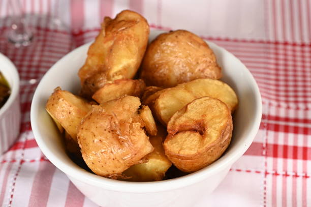 istock rustic potato roasted with garlic and spices snack. 1501149846