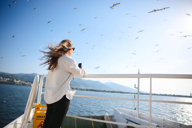 istock Young woman using smart phone on vacations 1501151673