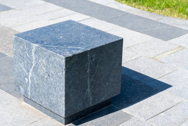 istock Comfortable stone bench in city park. 1501160112
