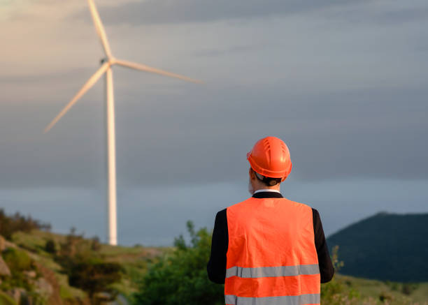 istock Male engineer working at a wind farm 1501160703