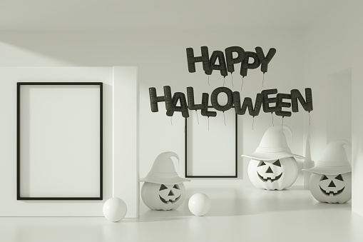 Happy Halloween balloons and pumpkins with empty frame in white room. Digitally generated image.