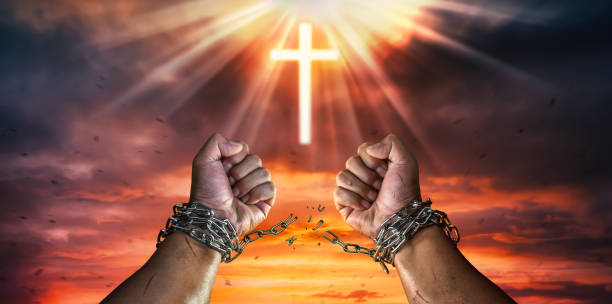 istock Cross Broken Chains.The concept of gaining freedom. 1501166065