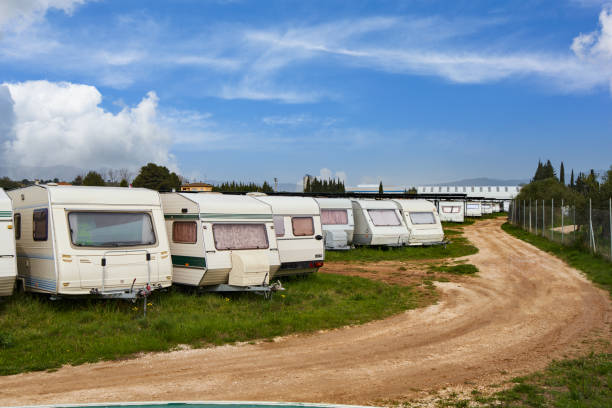 istock Dethleffs camping trailer for sale Caravan trailers parked 1501172010