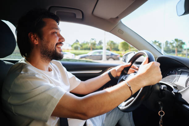 istock Driver man is driving and enjoy travel 1501173632