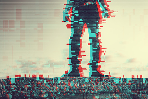 Low section of a man standing on the ground with a glitch effect