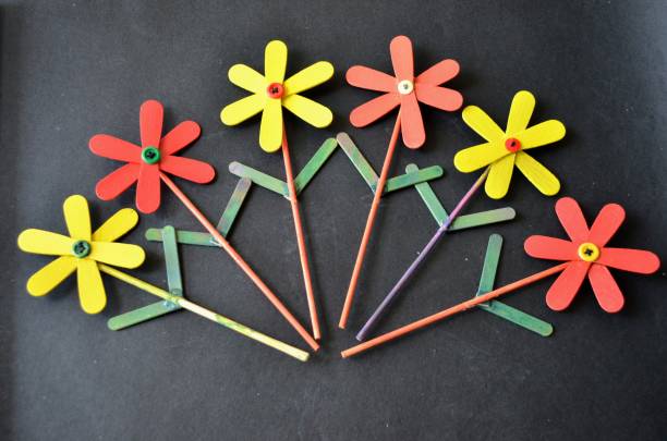 istock DIY Art and craft colourful popsicles sticks painted in different colors and make into beautiful flowers.  Satisfying. Hobby creativity kindergarten 1501176355