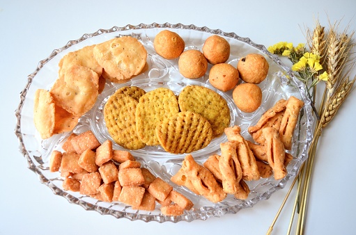 Indian savoury snack names Karela matari garlic, Achari mathi, Dice till, Kachori balls and Ajwain mathi. Very delicious and different in flavour to each other. Fresh, crispy and flavourful.Food items