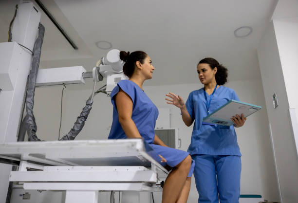 istock Radiologist getting a patient ready for an x-ray 1501183872