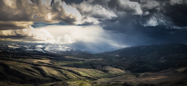 A stunning panoramic of a storm over Hells Canyon, Idaho.