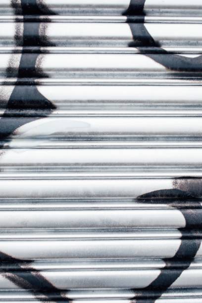 metallic silver painted corrugated metal garage door