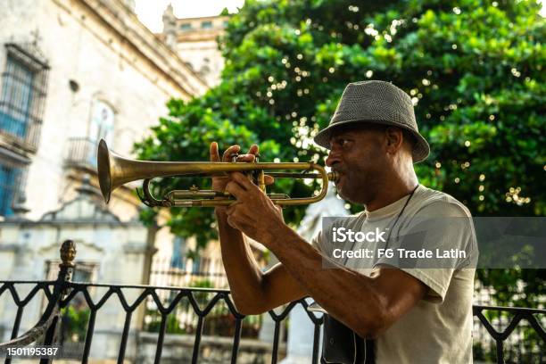 Mature Man Playing The Trumpet On The Streets Of Havana Cuba Stock Photo - Download Image Now