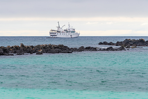 Galapagos cruise boat with copy space, Santa Fe Island, Galapagos national park, Ecuador.