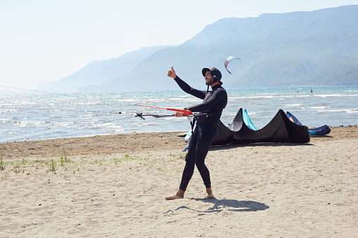A man is with kite surfing ready to fly