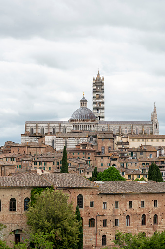 Siena Cathedral, Duomo di Siena, and Old Town of medieval city of Siena in the cloudy day