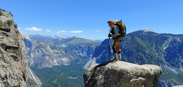 Hiker atop Yosemite Falls 1,430'