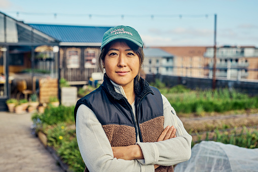 Portrait of an urban farmer on a rooftop farm.