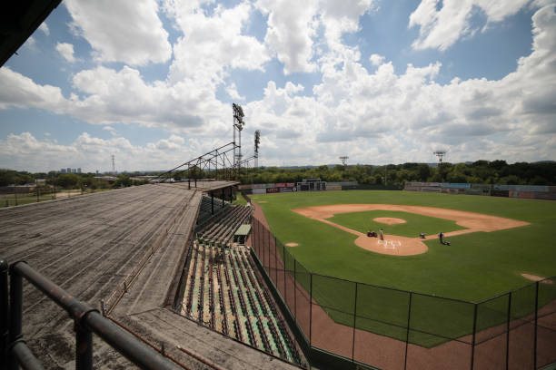 Baracoa, Cuba - December 14, 2013: Young people playing baseball  in the old stadium of Baracoa.