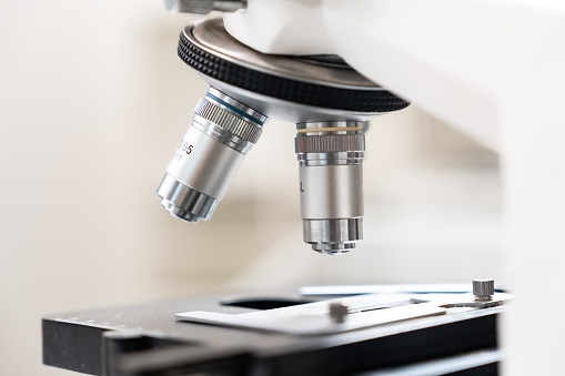 Closeup of Scientific microscope data analysis in the laboratory, medicine equipment research setting in lab for chemistry analysis