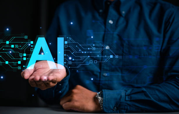 istock hand of businessman hold artificial intelligence symbol. ai technology innovation for future. 1501389836